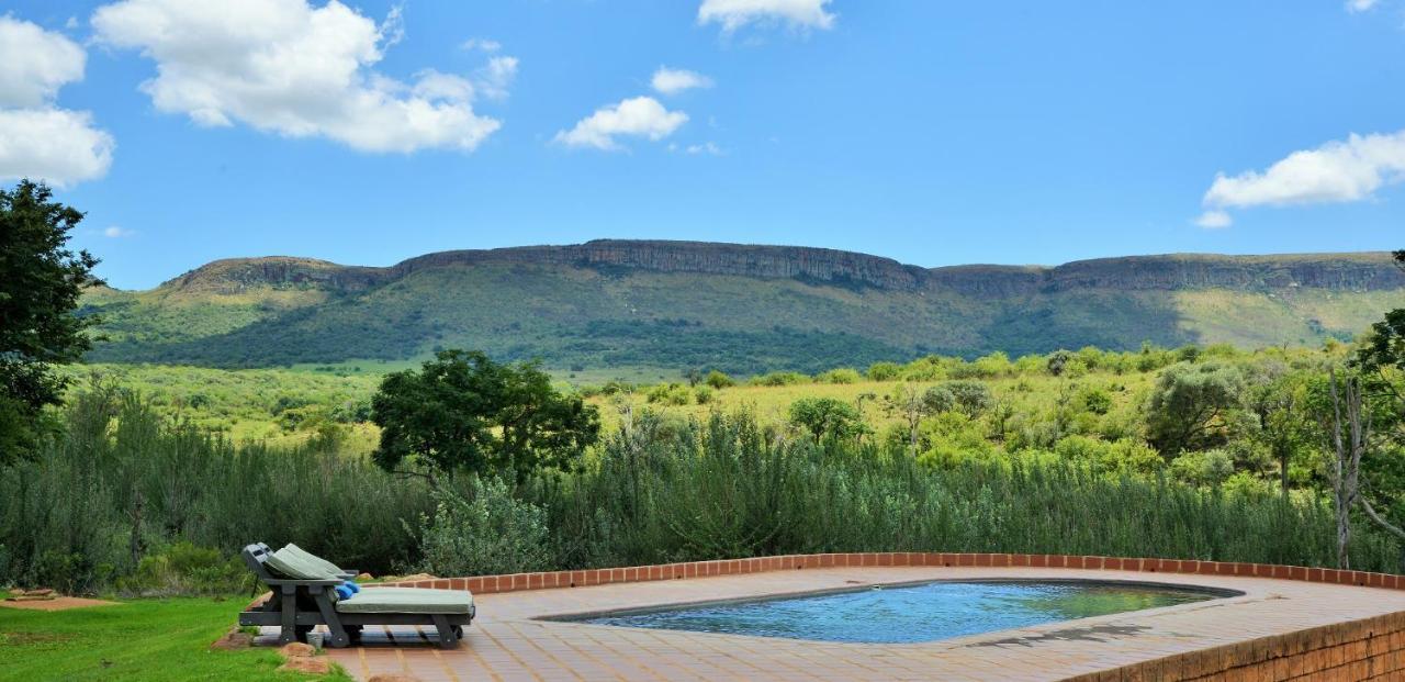African Hills Safari Lodge & Spa มากาลีสเบิร์ก ภายนอก รูปภาพ